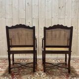 Paire de fauteuils de style Louis XIII os de mouton en cannage.