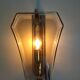 Pair of brass and curved glass wall lamps from the 80s