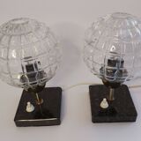 A pair of bedside lamps