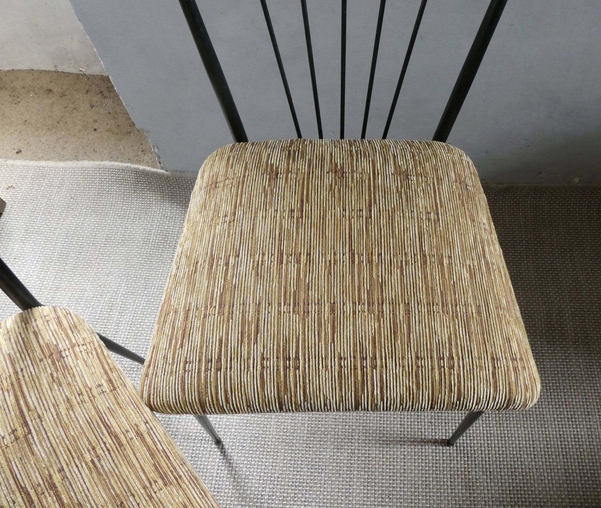Pair of Colette Gueden chairs, black metal and fabric.