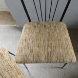 Pair of Colette Gueden chairs, black metal and fabric.