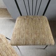 Pair of Colette Gueden chairs, black metal and fabric.