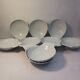 10 small dishes / ramekins / shell-shaped cups. French porcelain