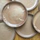 Lot de 8 assiettes plates en grès émaillé vintage
