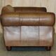 Vintage leather sofas by Thomas Lloyd with Kilim cushions.