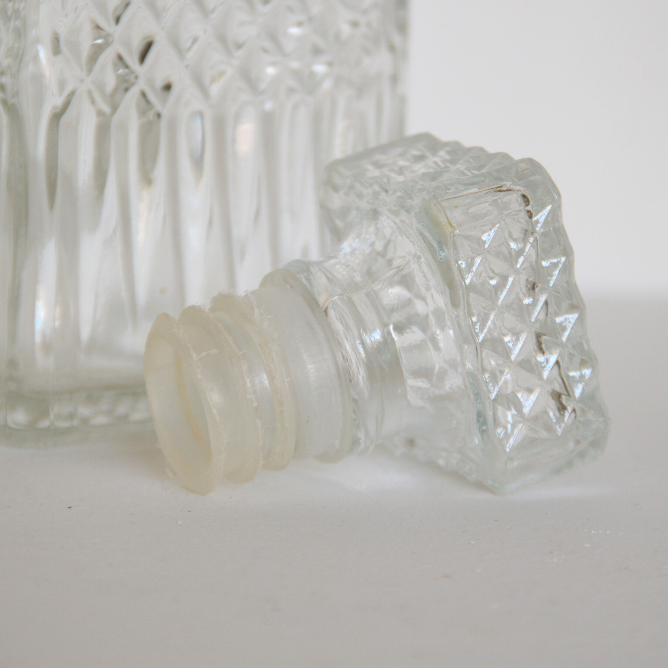 Old vintage glass whisky decanter