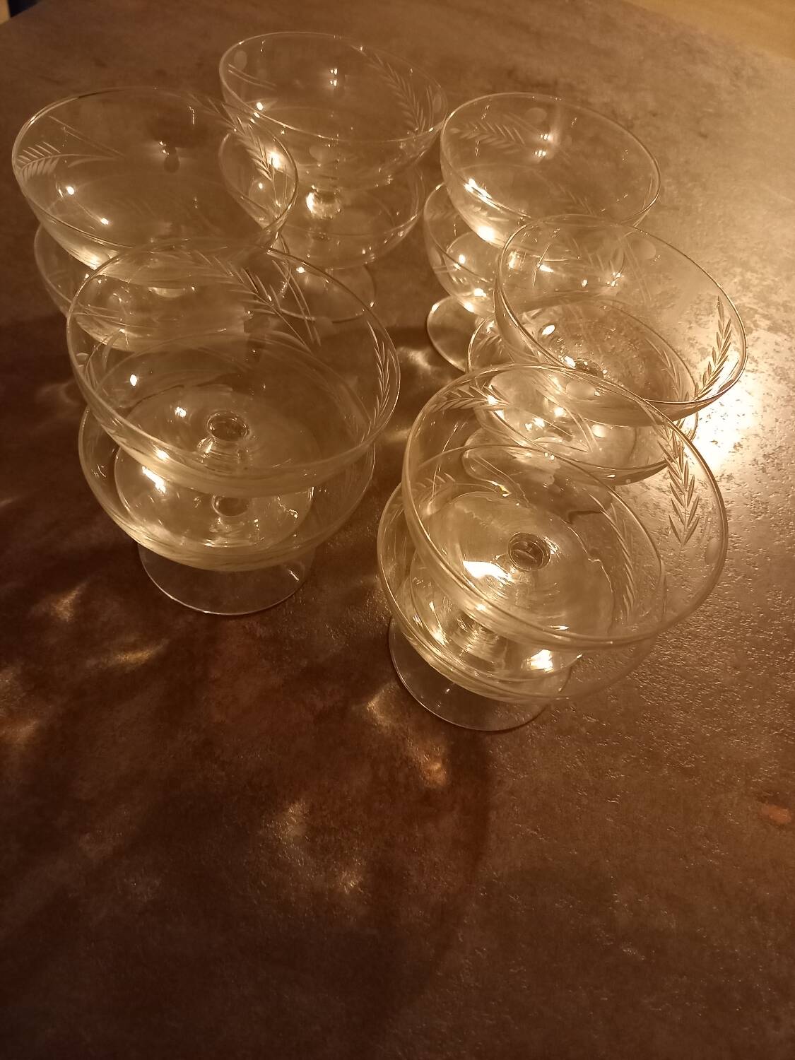 12 crystal champagne glasses engraved with a wheat stalk motif