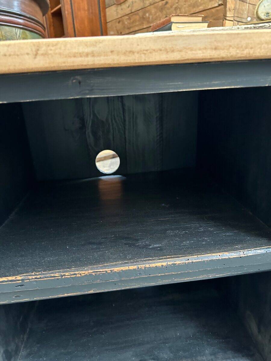 Old workshop furniture transformed into a TV unit.