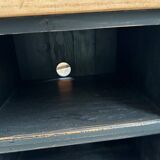 Old workshop furniture transformed into a TV unit.