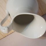 Antique pitcher pitcher in white porcelain