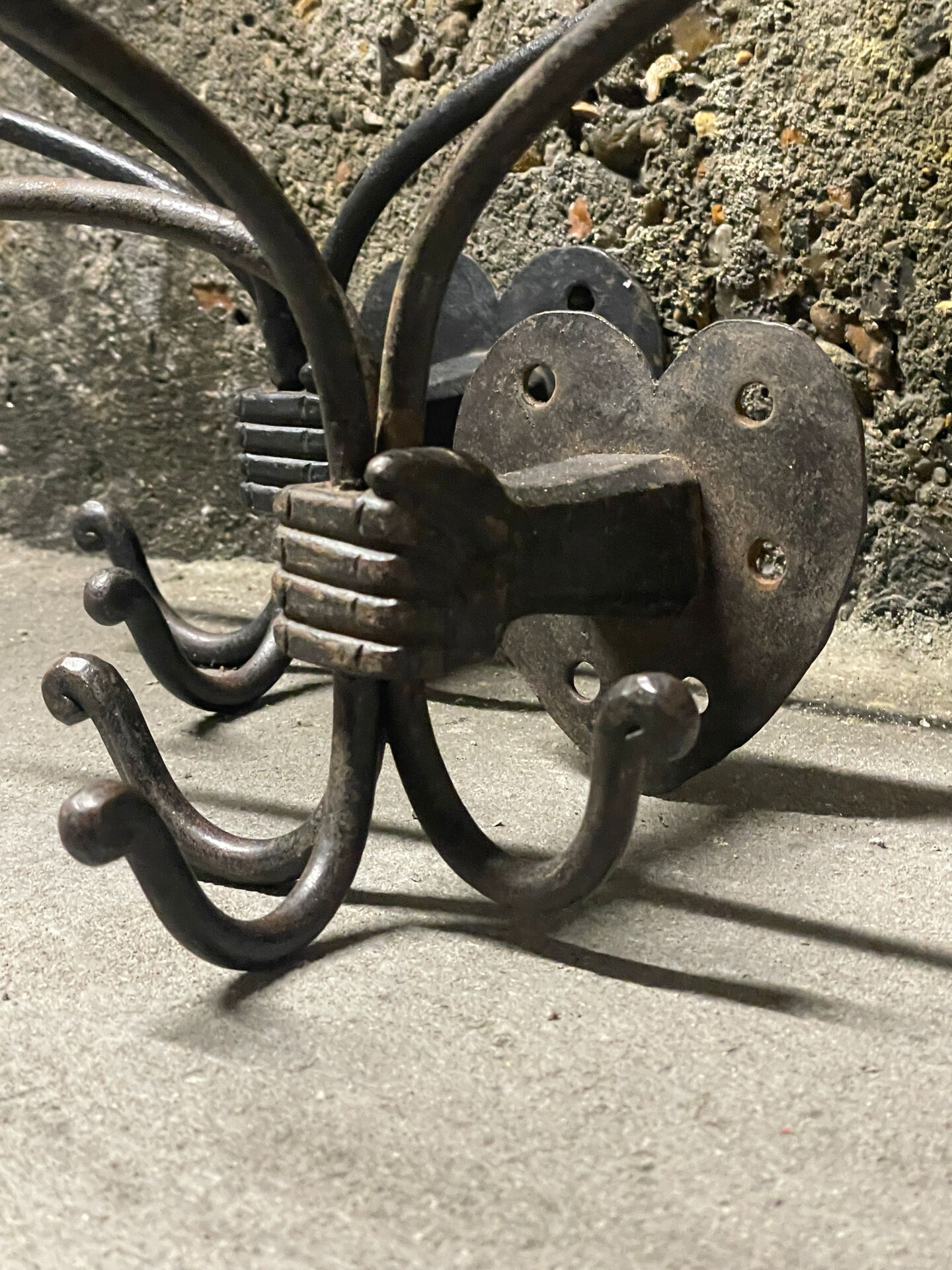 Brutalist pair of wall-mounted coat hooks.