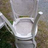 4 old wooden and cane chairs