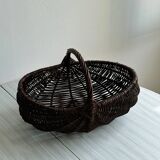 Dark wicker basket, mushroom basket.