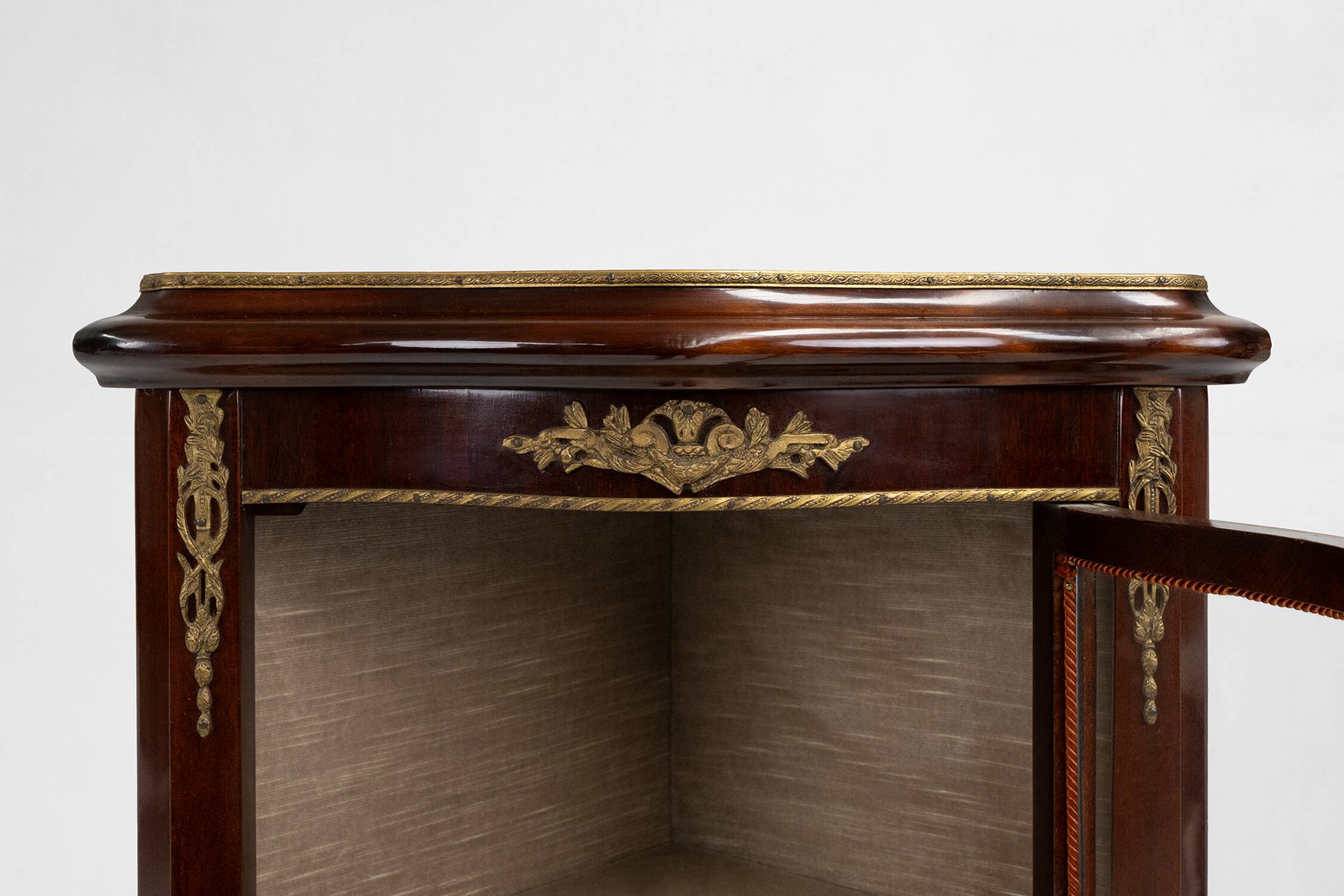 20th Century French Louis XV style corner display cabinet with arched glass, ca 1950