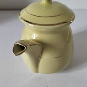 Vintage teapot in pastel yellow earthenware with gold trim