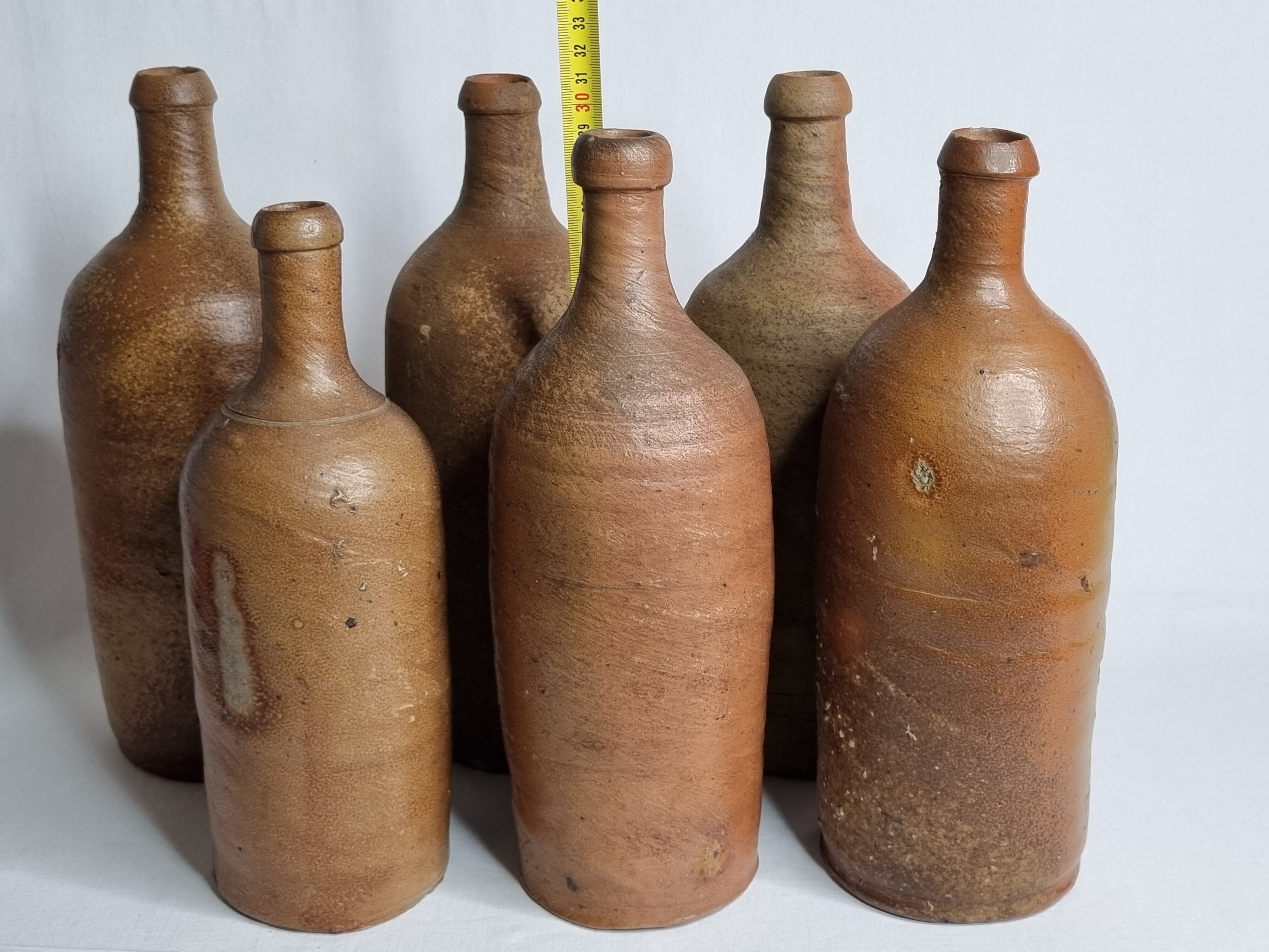Set of 6 hand-turned stoneware bottles, 31 cm
