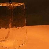 Minimalist glass table lamp from the 80s with a pleated shade.