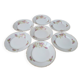 7 dessert plates in porcelain with a violet lilac design and a gold rim.