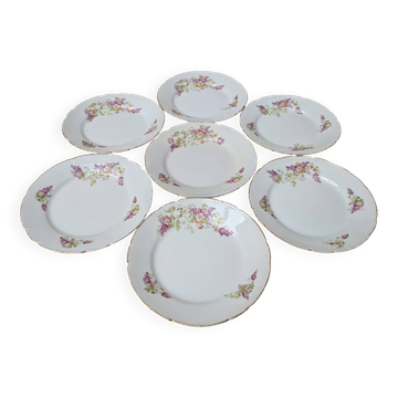 7 dessert plates in porcelain with a violet lilac design and a gold rim.