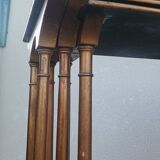 Sets of three nesting tables with painted landscape decorations in poplar.