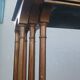 Sets of three nesting tables with painted landscape decorations in poplar.