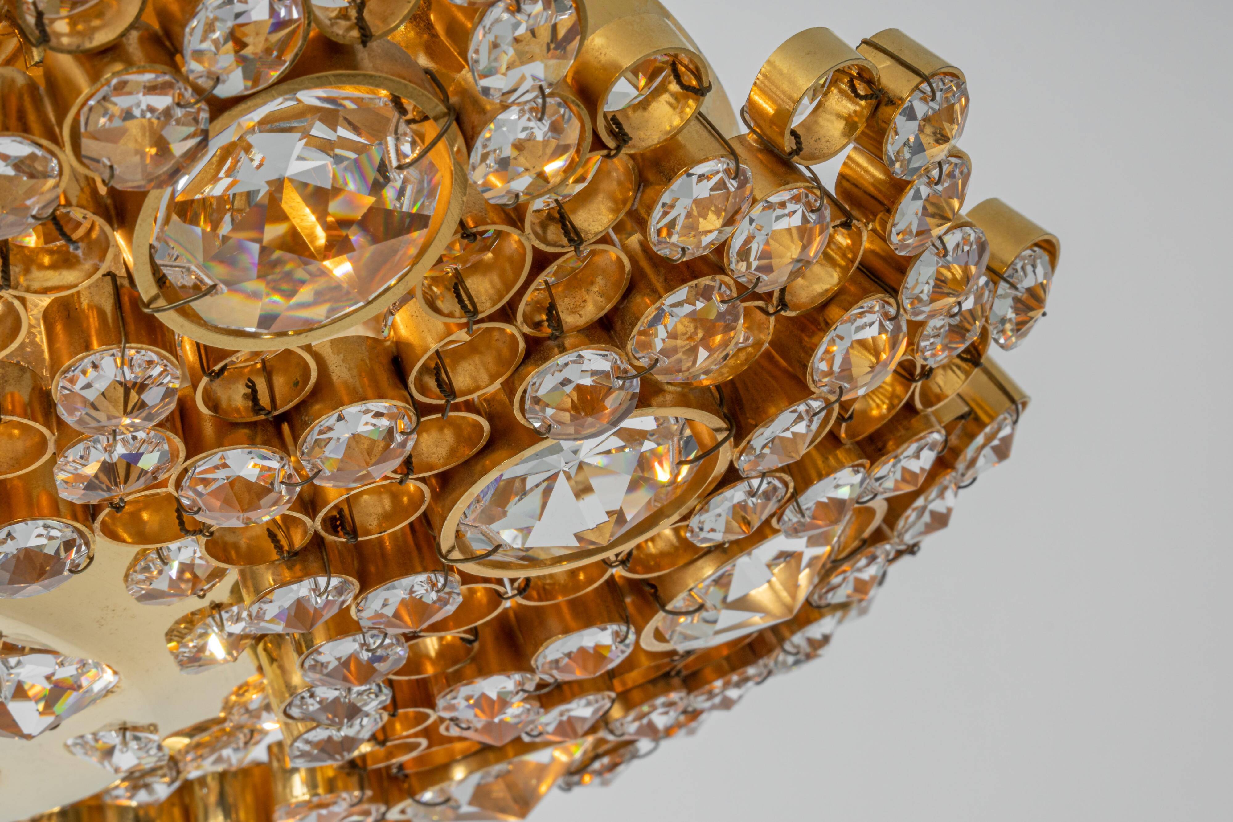 Floral wall light in gilded brass and cut glass by Palwa, Germany, 1970s.