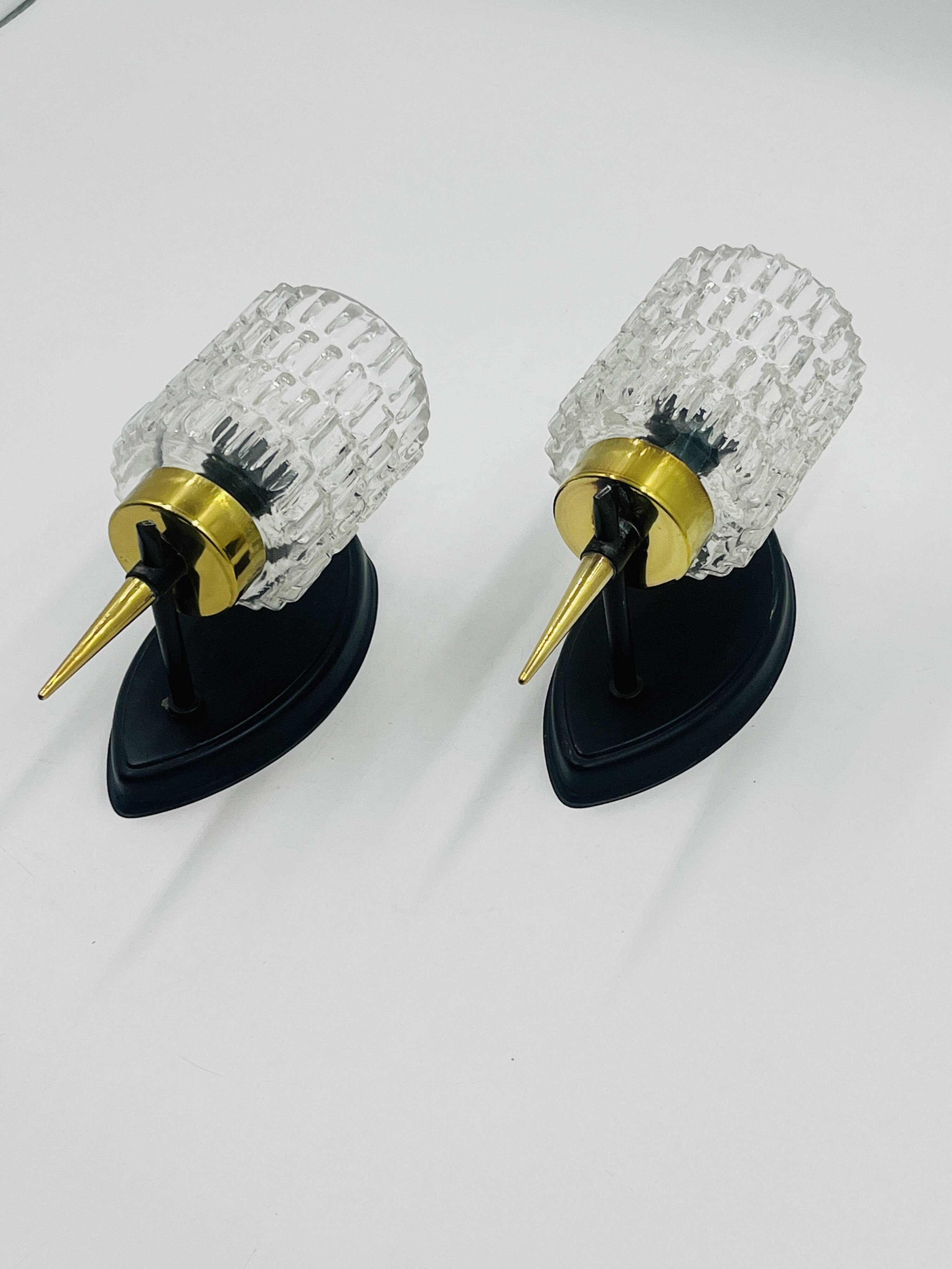 Pair of vintage wall lights with textured glass, attributed to Maison Arlus.