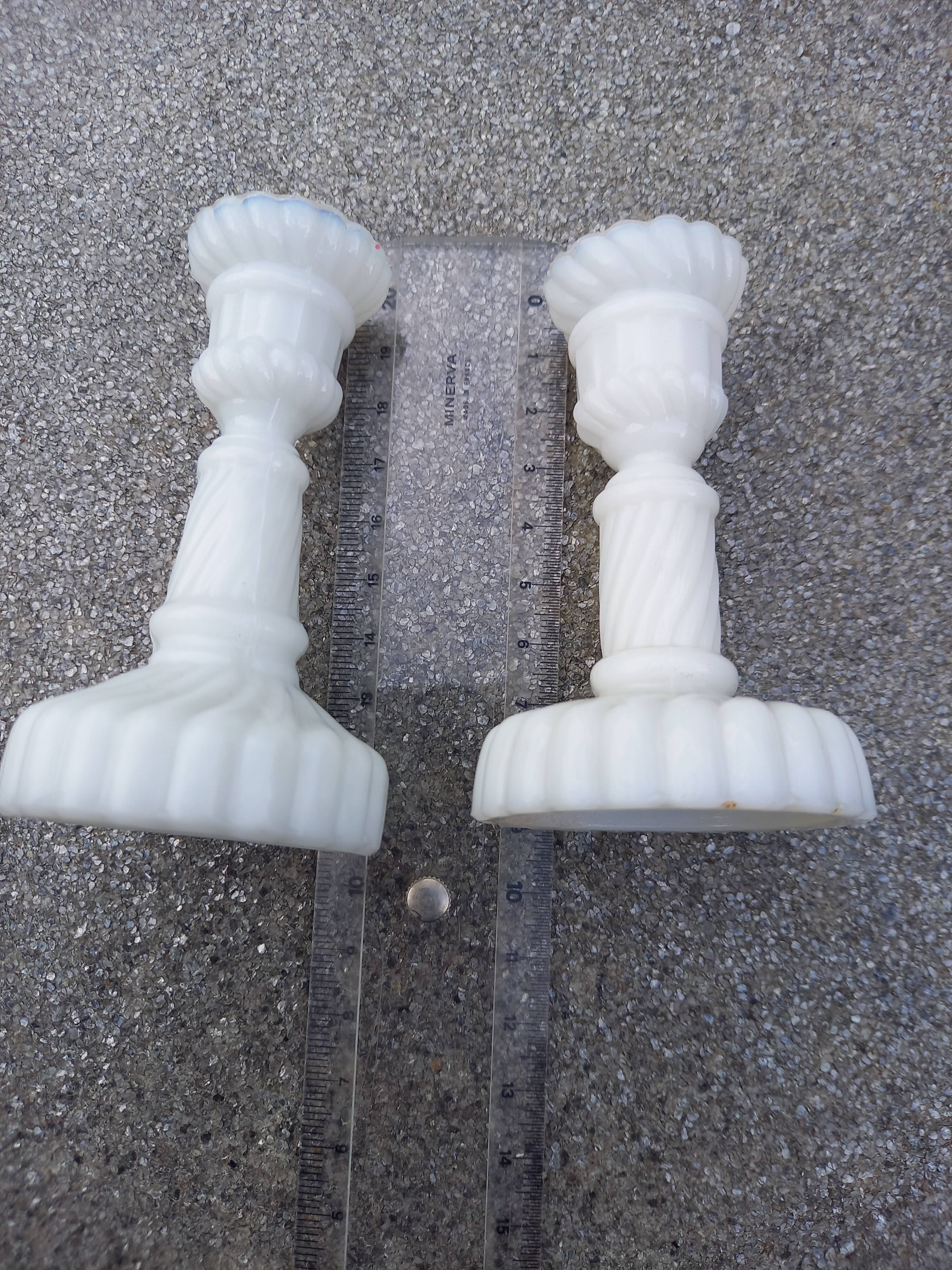 2 candle holders and earthenware vase