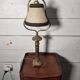 Empire-style table lamp in gilded bronze from the 19th century.