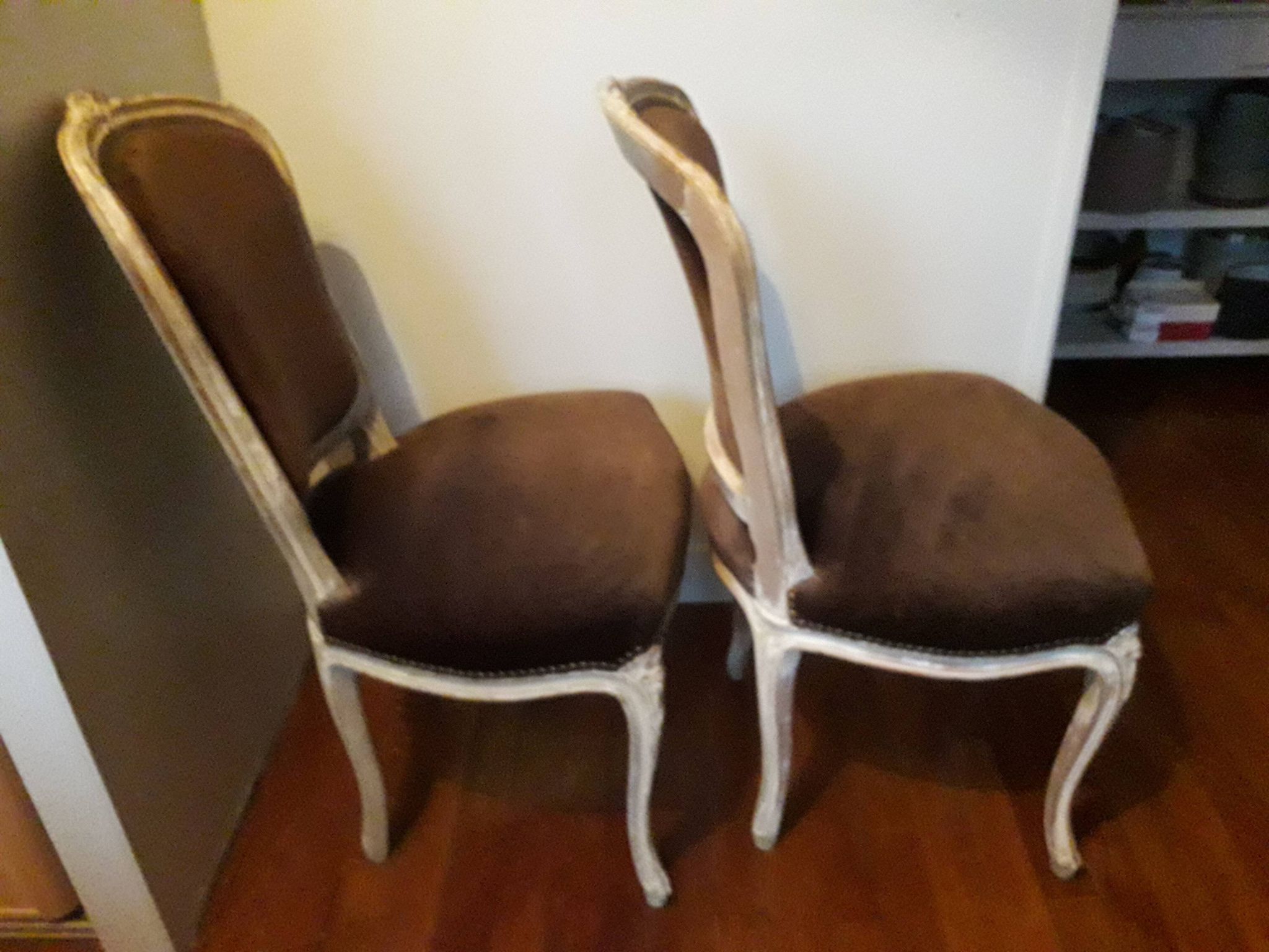 A pair of Louis XV style armchairs in wood and velvet fabrics