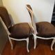 A pair of Louis XV style armchairs in wood and velvet fabrics