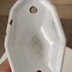 Antique Art Deco wall coat hook in enamelled cast iron.