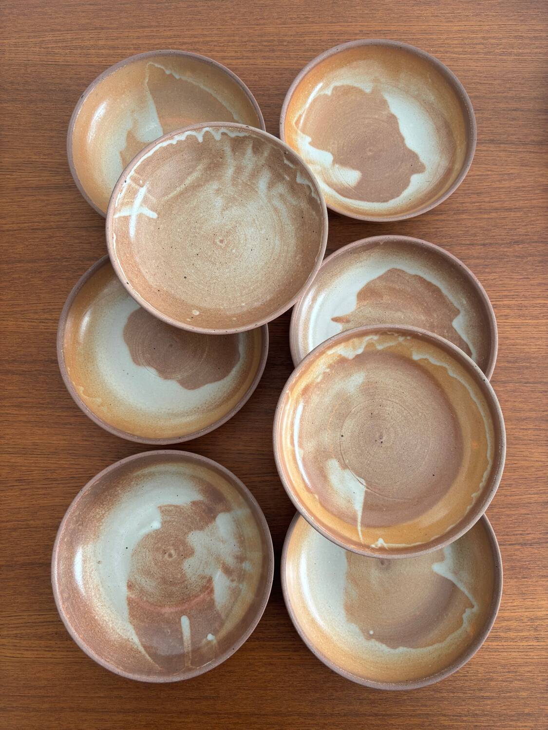 Lot of vintage 1970s stoneware deep plates - handmade beige ceramics.