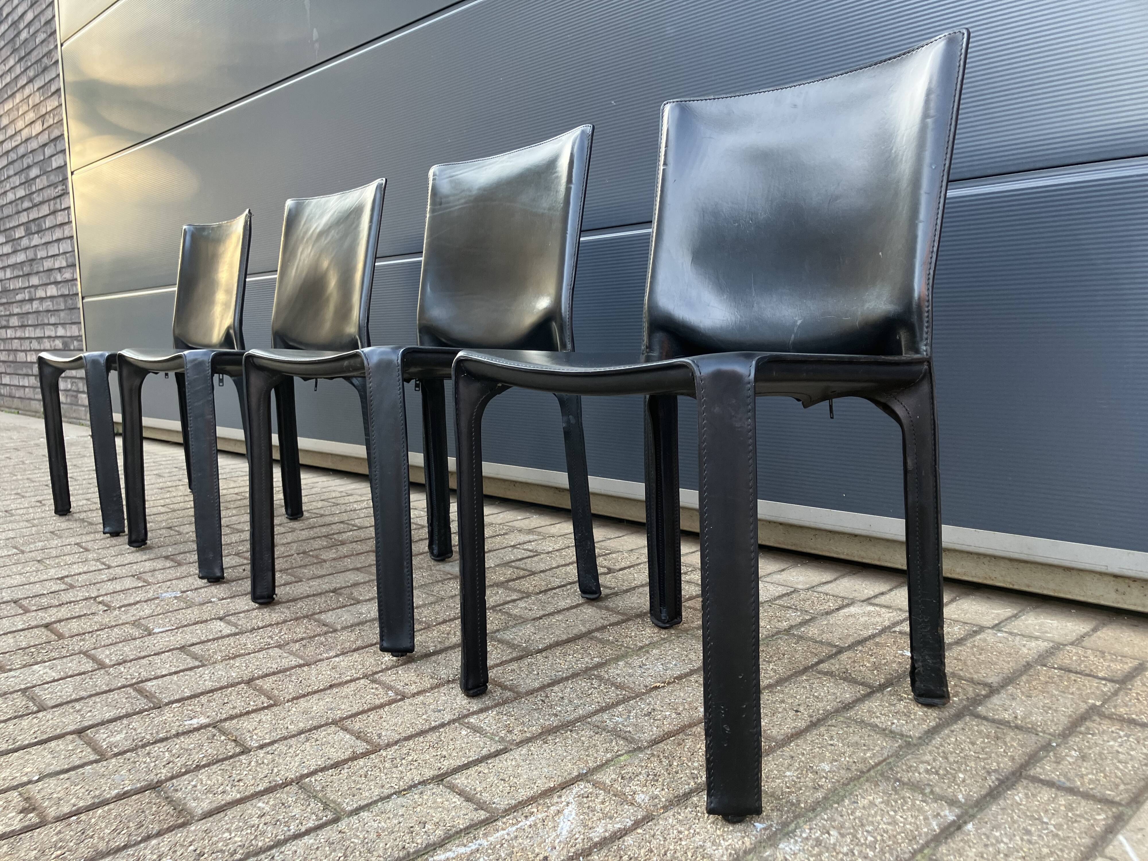 4 black Cassina Cab chairs by Mario Bellini