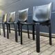 4 black Cassina Cab chairs by Mario Bellini