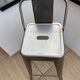 Set of 3 Tolix bar stools in raw (grey) varnished steel