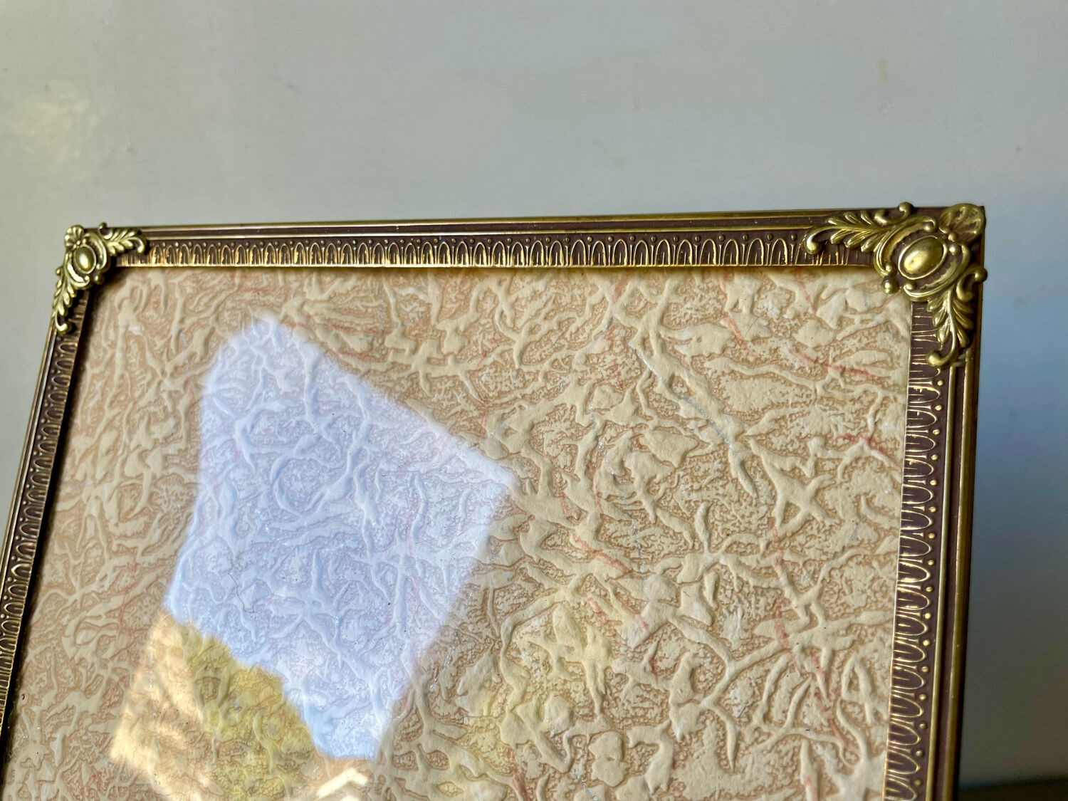 Metal vintage frame in gold colored brass