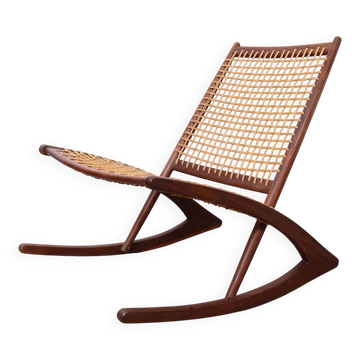 A vintage mid-century Danish Fredrik Kayser style rocking chair in teak
