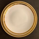 8 flat porcelain plates from Limoges Bernardaud, gilded Greek decoration, twentieth century