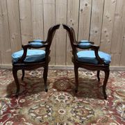 Paire de fauteuils de style Louis XV en cannage