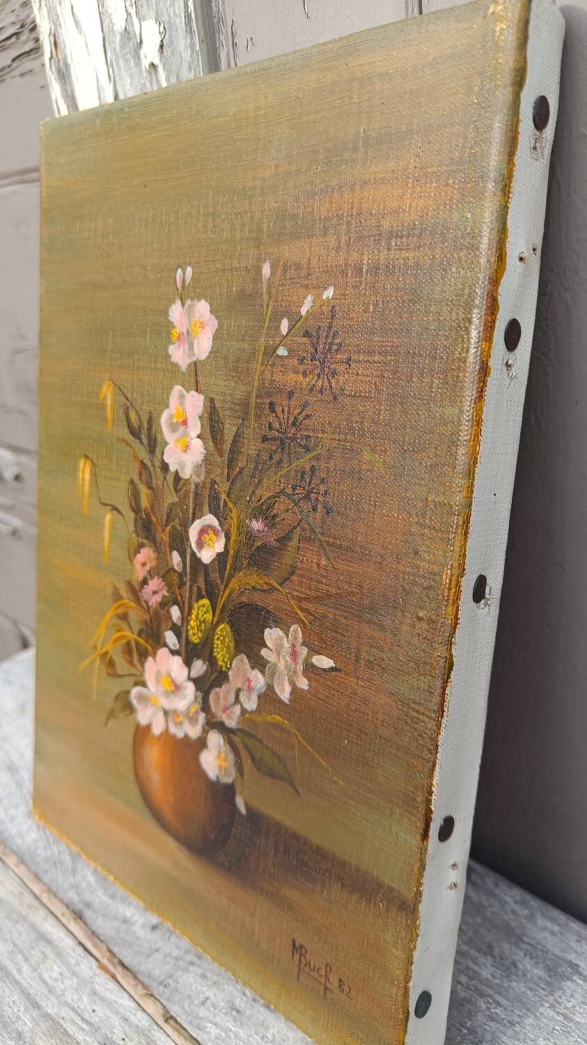 Canvas painting of a bouquet of flowers.