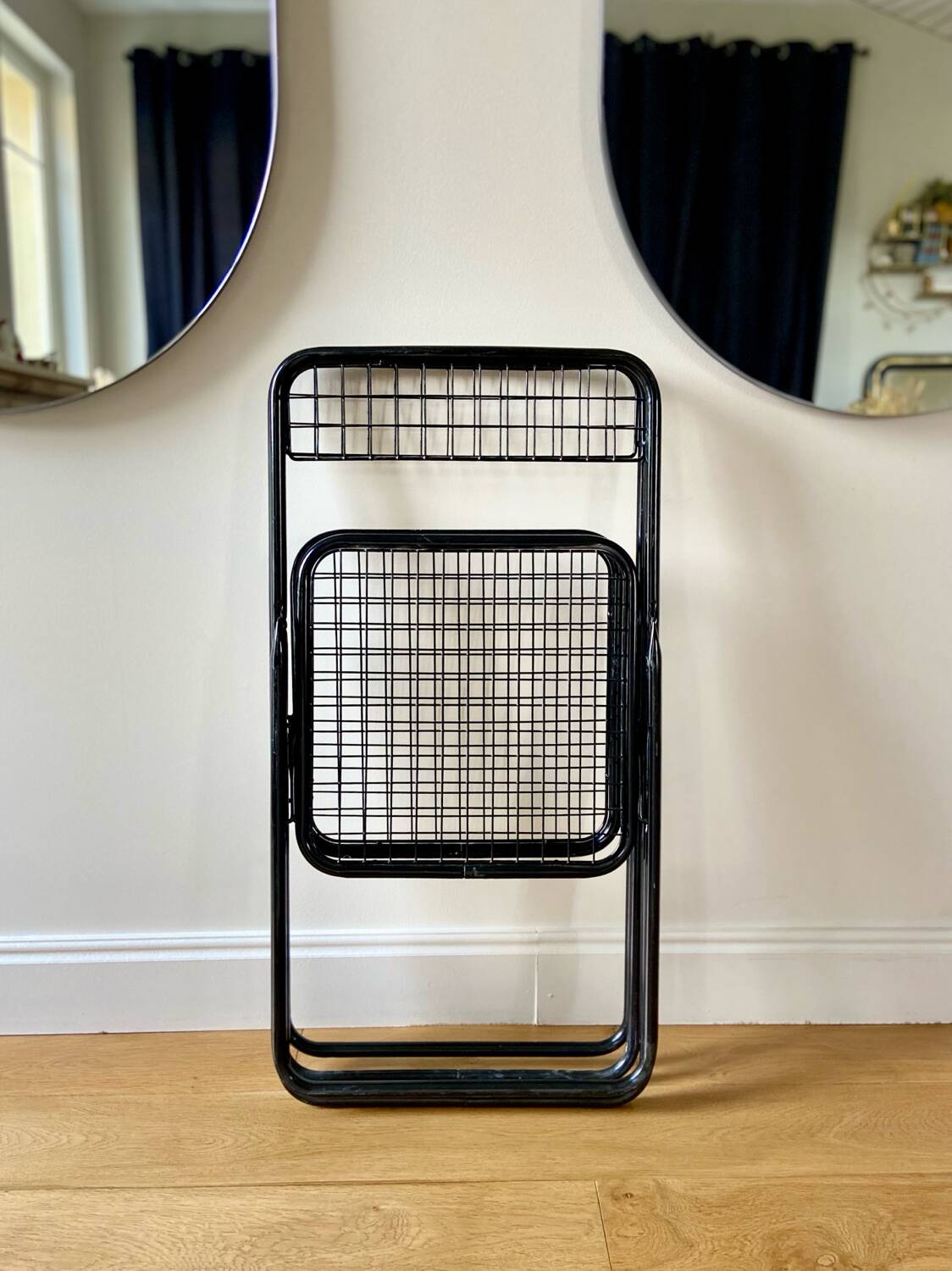 Pair of black lacquered metal "Ted Ned" chairs by Niels Gammelgaard, circa 1970-1980