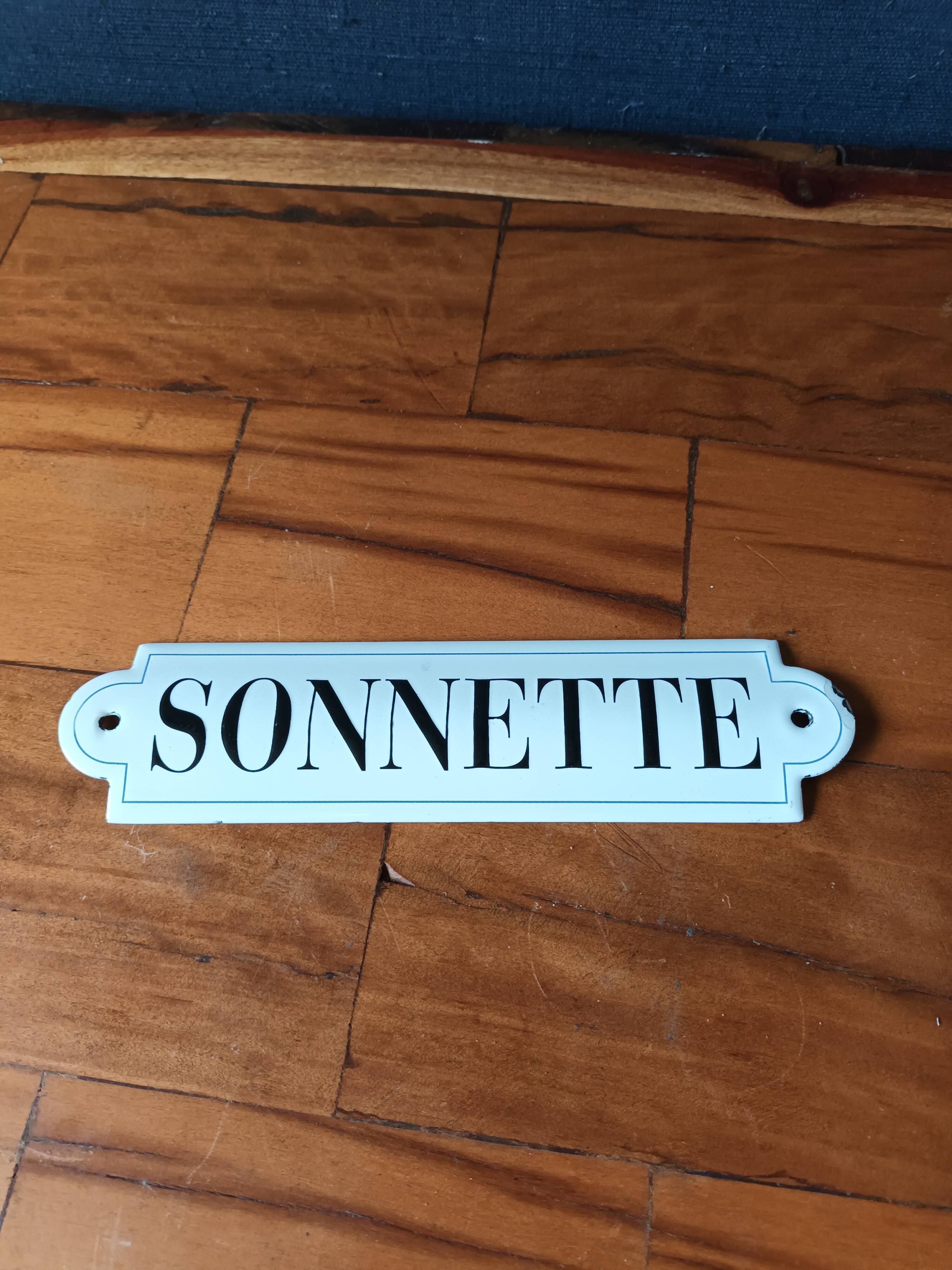 Doorbell enamel plate