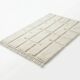 Berber rug with a white graphic pattern.