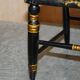 Georgian side bergère circa 1825, ebonised and hand-painted in Baltimore style.
