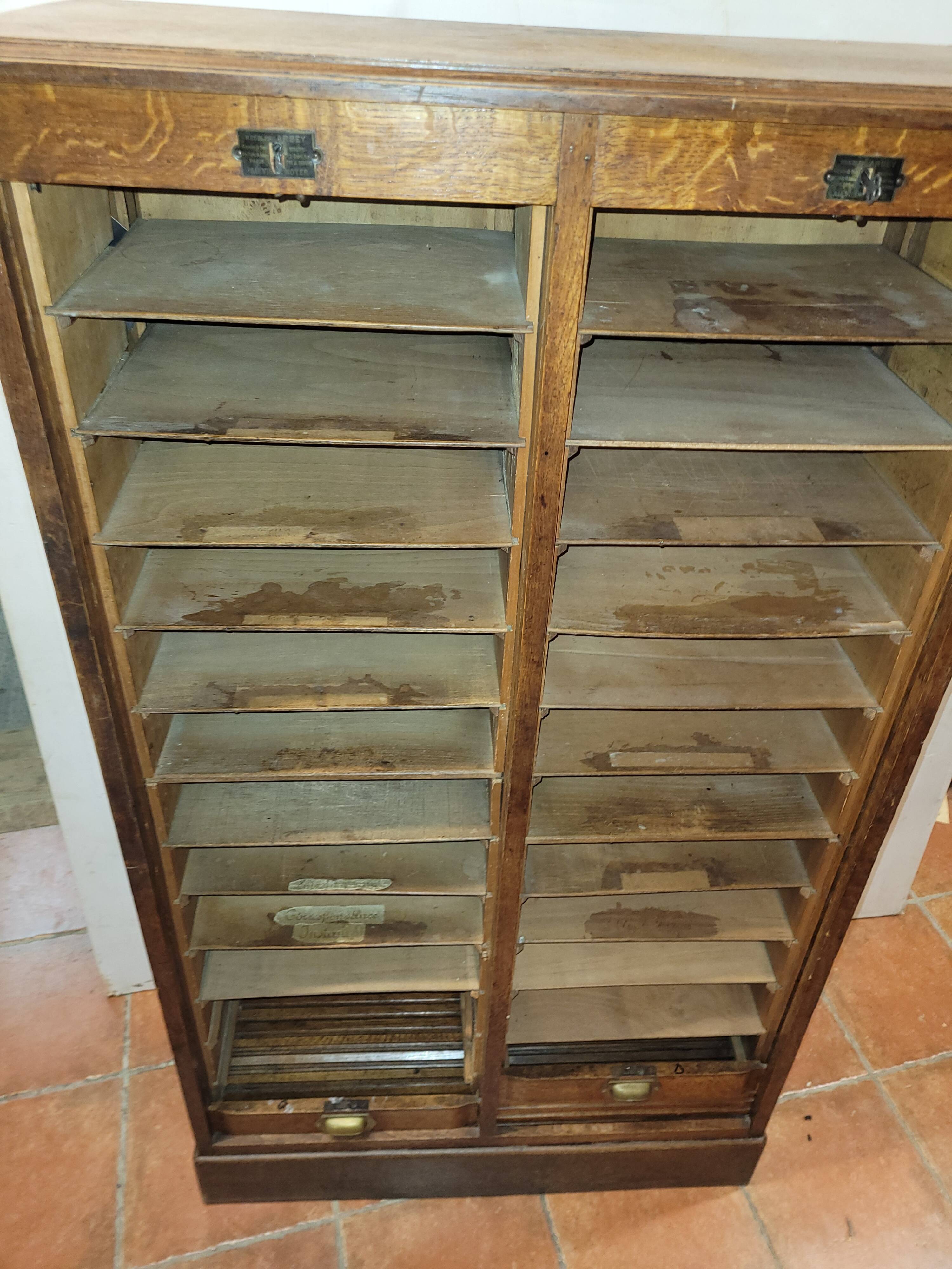 Old double curtained oak filing cabinet