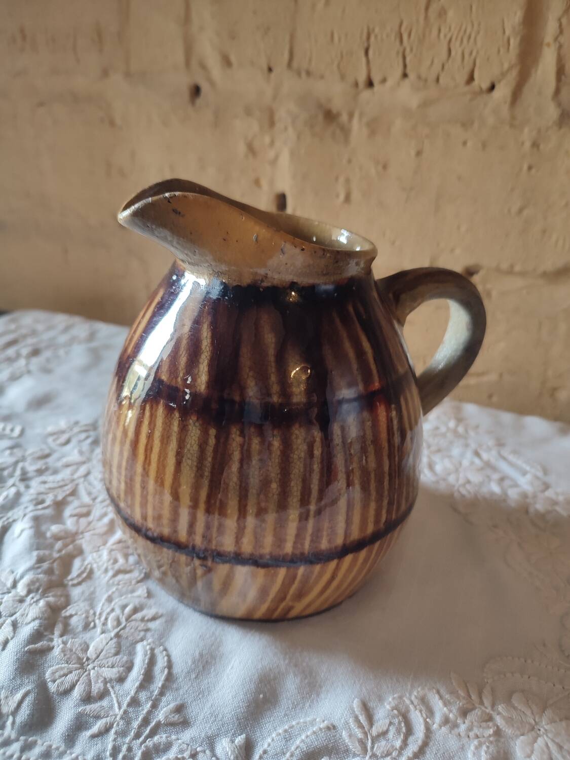 Old sandstone pitcher vase