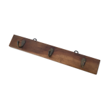 Wall hook from wood and brass