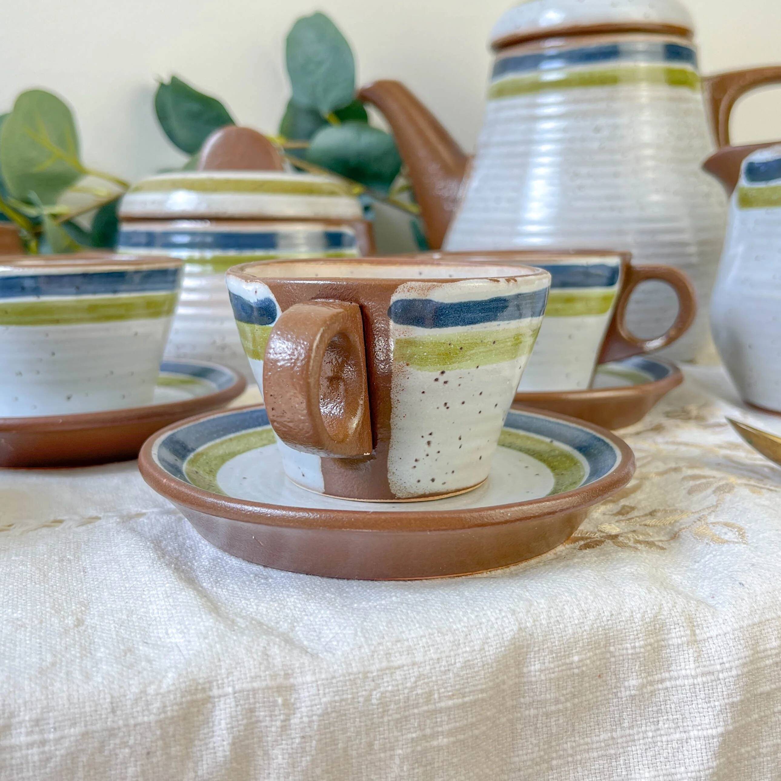 Vintage 1950s speckled stoneware coffee set with grey, green, and blue stripes