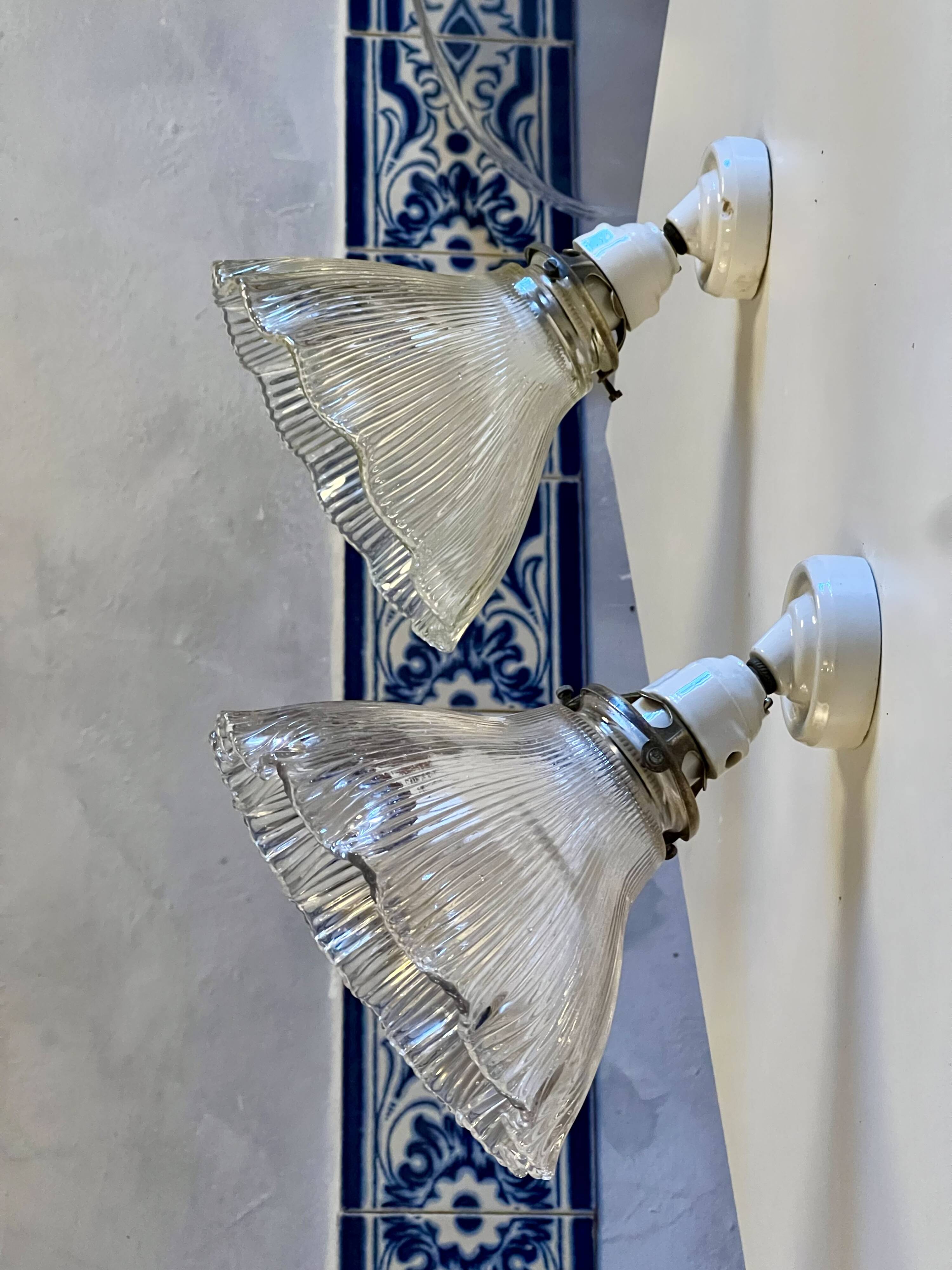 Holophane wall lights with bistro-style porcelain supports